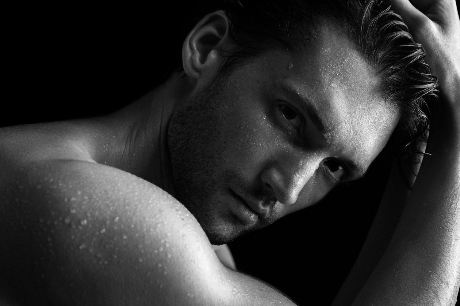 Woman with long hair and natural makeup.